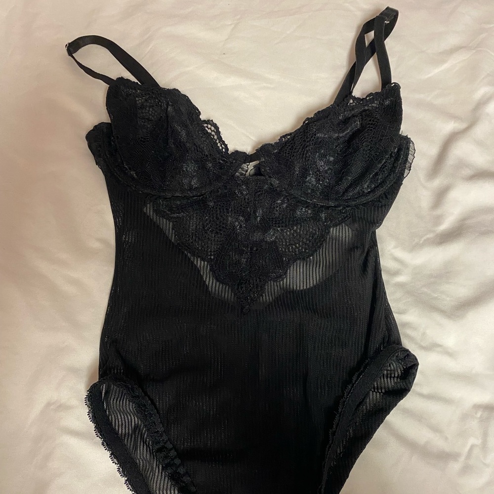 Black S lace bodysuit from revolve